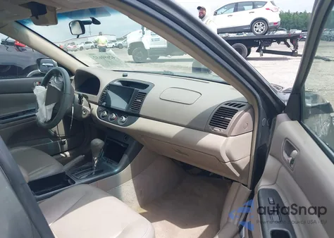 2006 Toyota Camry Le from USA, damaged, VIN JTDBE30KX63041661